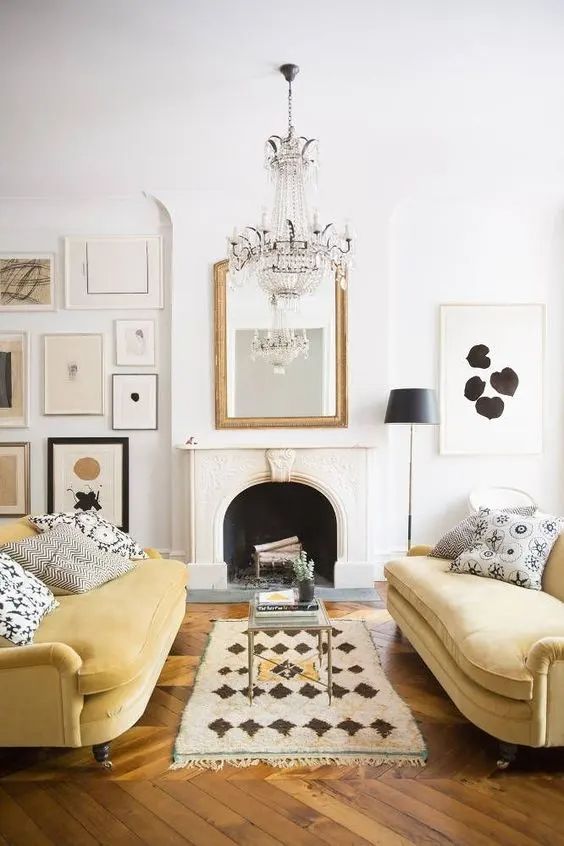 a duo of light yellow sofas