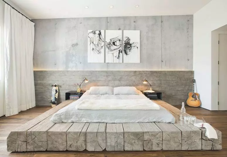 یک اتاق خواب صنعتی خنثی با دیوارهای بتنی و چوبی 